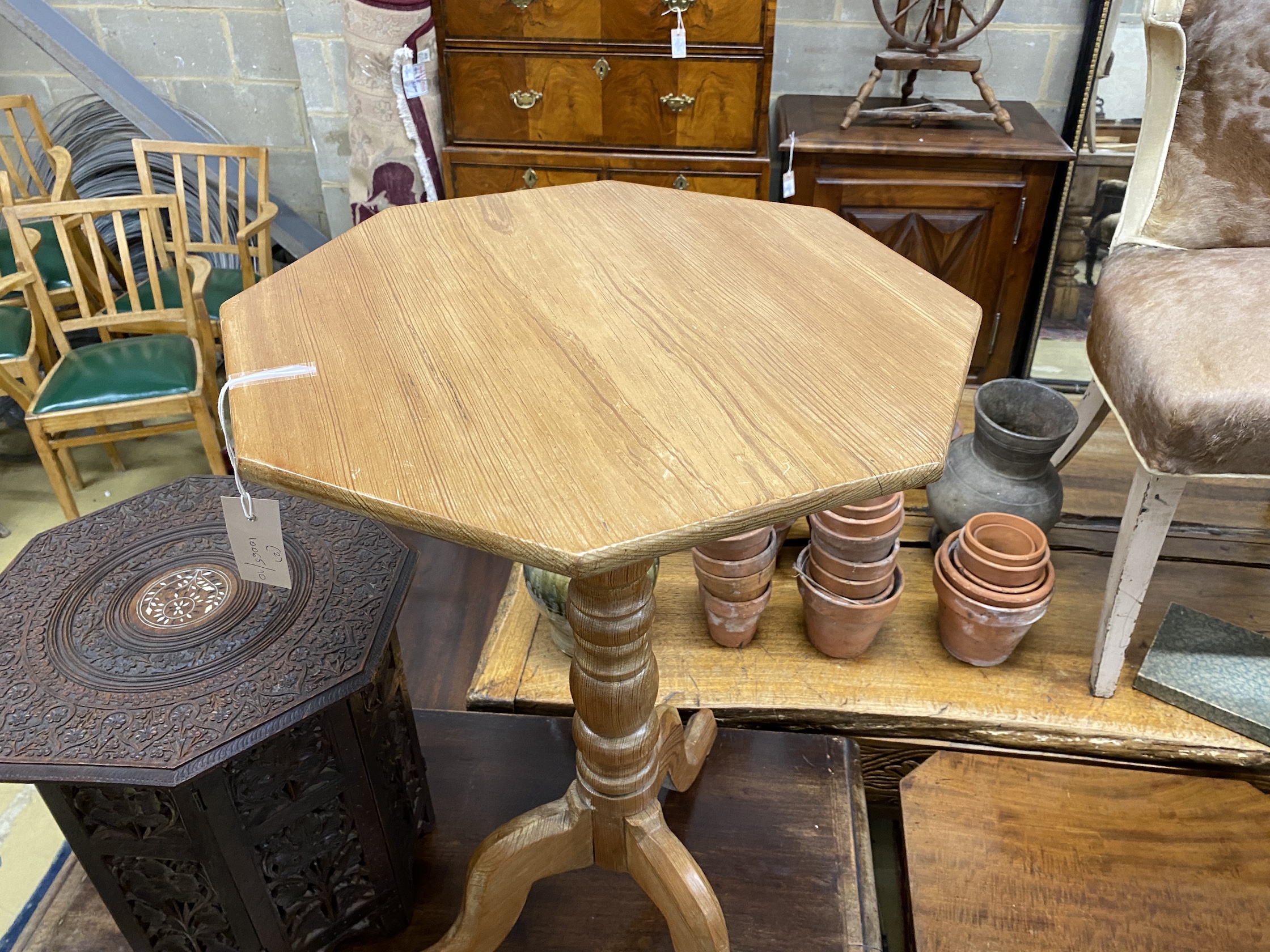 A Victorian style octagonal pine tripod wine table, width 47cm, height 72cm together with an Indian bone inlaid octagonal hardwood folding occasional table